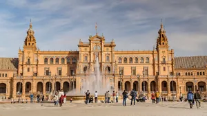 Tourists enjoying a sunny day at the famous Plaza de España in Seville, Spain. jigsaw puzzle