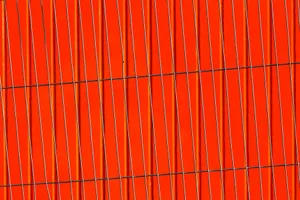 Modern abstract image featuring vertical lines against a bold red background. jigsaw puzzle
