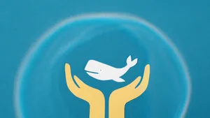 Illustration of hands holding a whale symbolizing ocean conservation and protection. jigsaw puzzle
