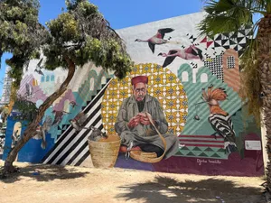 Colorful street art mural depicting cultural and wildlife elements in Médenine, Tunisia. jigsaw puzzle