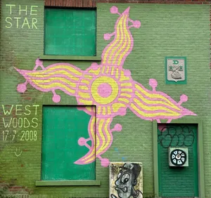 Vibrant street art decorates a wall in Beveren, Belgium, featuring unique graffiti styles. jigsaw puzzle