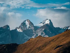 Majestic view of the snowcapped peaks in Ak-Sai, Kyrgyzstan, showcasing natural beauty and extreme terrain. jigsaw puzzle