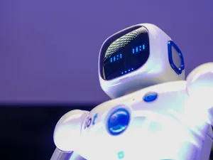 A modern humanoid robot with digital face and luminescent screen, symbolizing innovation in technology. jigsaw puzzle