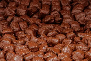 Delicious assortment of chocolate covered treats creating a sweet temptation. jigsaw puzzle