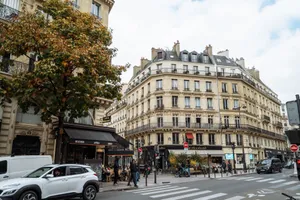 A picturesque view of a Paris street showcasing classic architecture and autumn vibes. jigsaw puzzle