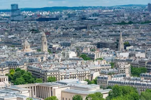 Stunning aerial view of Paris showcasing historic architecture and skyline on a clear day. jigsaw puzzle