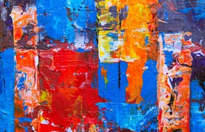 A colorful and dynamic abstract painting with rich textures and bold colors on canvas. jigsaw puzzle
