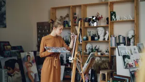 Female artist working on canvas in her art studio. jigsaw puzzle