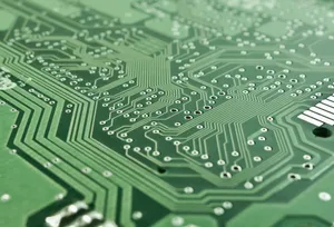 Detailed view of a green circuit board with complex patterns and pathways. jigsaw puzzle