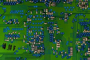 Detailed view of a circuit board highlighting electronic components. jigsaw puzzle