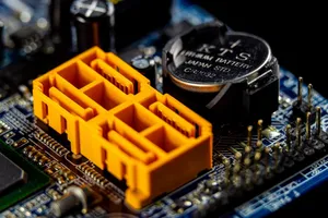 Close-up view of a motherboard with visible electronic components and connectors. jigsaw puzzle