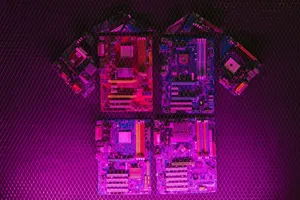 Creative arrangement of circuit boards with neon lighting, highlighting modern technology aesthetics. jigsaw puzzle