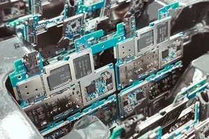 Close-up of intricate circuit boards in a Vietnamese factory, capturing modern electronics production. jigsaw puzzle