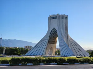 Iconic Azadi Tower in Tehran, Iran, under clear blue skies, perfect for travel inspiration. jigsaw puzzle