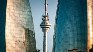 Stunning view of Baku's iconic Flame Towers with the TV Tower in between, captured during sunset. jigsaw puzzle