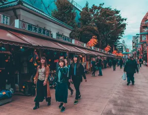 Vibrant street shopping scene in Tokyo's bustling district, capturing diverse pedestrians. jigsaw puzzle