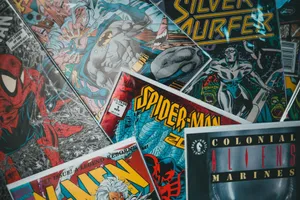 From above closeup of collection of assorted creative comic magazines with colorful illustrations spread out on surface jigsaw puzzle