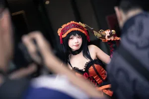 A colorful and detailed cosplay portrait of a woman wielding a prop weapon at a convention. jigsaw puzzle