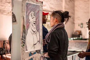 Back view contemplative ethnic female with creative haircut in casual wear looking at caricature painting in modern art exhibition jigsaw puzzle