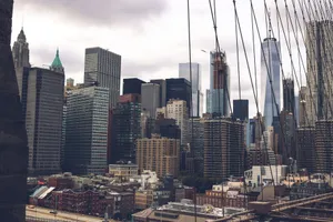 A dramatic view of the skyscrapers of New York City captured from the Brooklyn Bridge. jigsaw puzzle