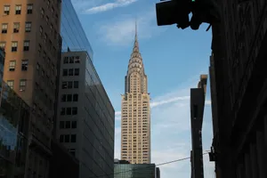 Iconic view of the Chrysler Building against a clear blue sky in New York City. jigsaw puzzle