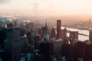 Aerial view of New York City's skyline at dawn featuring the Chrysler Building. jigsaw puzzle