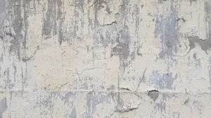 Detailed texture of a weathered concrete wall featuring peeling paint and abstract patterns. jigsaw puzzle