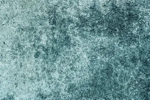 Close-up of a textured concrete wall, ideal for backgrounds and design projects. jigsaw puzzle