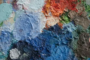 Close-up of a colorful, textured oil paint surface, showcasing vivid abstract patterns. jigsaw puzzle