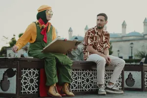 Artist sketches a portrait of a seated man in a lively urban setting with cultural architecture. jigsaw puzzle