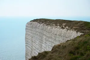 Explore the majestic white chalk cliffs with a breathtaking seaside view in Eastbourne, UK. jigsaw puzzle