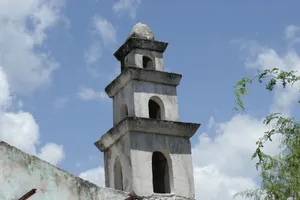 Stone tower in Dzemul, Mexico, with vintage architectural style against a clear blue sky. jigsaw puzzle