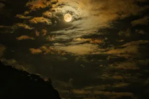A captivating full moon shining through clouds over Nelson, Wisconsin, USA. jigsaw puzzle