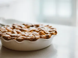 Close-up of a delicious homemade pie in a ceramic dish, perfect for dessert lovers. jigsaw puzzle