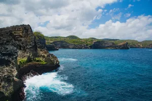 Stunning coastal cliffs and vibrant blue ocean at Nusa Penida, Bali, Indonesia. jigsaw puzzle