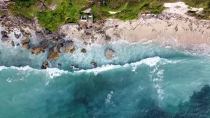 Stunning aerial view of Cemunggak Beach with turquoise waves and sandy shore on Bali, Indonesia. jigsaw puzzle