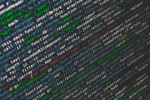 Close-up of colorful programming code displayed on a computer screen. jigsaw puzzle
