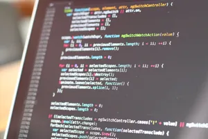 Close-up view of colorful code on a laptop screen, showcasing programming concepts. jigsaw puzzle