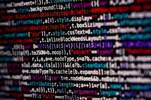 Close-up of multicolored code on a computer screen, highlighting programming. jigsaw puzzle