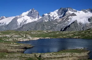 Beautiful Alpine lake with snowy mountains in La Grave, France, a perfect nature escape. jigsaw puzzle