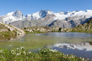Breathtaking landscape of snow-capped mountains and lake in La Grave, France. jigsaw puzzle
