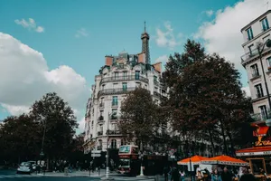 Charming urban street scene in Paris with classic architecture and the Eiffel Tower. jigsaw puzzle