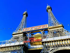 A modern replica of Eiffel Towers in Bhopal's People's Smart City under a clear blue sky. jigsaw puzzle