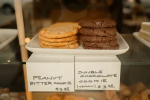 Display of peanut butter and vegan chocolate cookies in a bakery shop. jigsaw puzzle