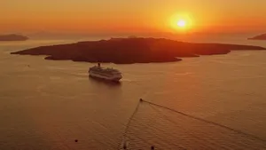 A breathtaking sunset view of a cruise ship near the island of Santorini, Greece. jigsaw puzzle