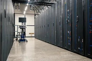 Steel framework cabinets housing servers networking devices and cables in contemporary equipped data center jigsaw puzzle