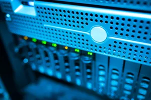 Focused view of a modern data server rack with blinking lights in a blue-lit environment. jigsaw puzzle