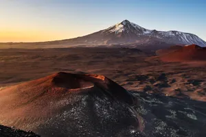 Stunning view of volcanoes at sunset on the Kamchatka Peninsula, showcasing natural beauty. jigsaw puzzle