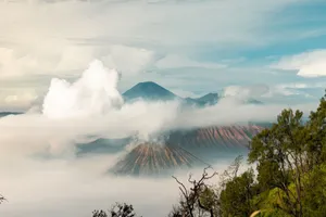 Stunning aerial view of Mount Bromo surrounded by mist and clouds in East Java, Indonesia. jigsaw puzzle