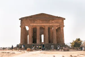 Tourists visit the ancient Temple of Concordia, a historic landmark in Agrigento, Italy. jigsaw puzzle